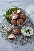 Minced meat balls with feta cheese filling