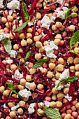 Chickpeas salad with beetroot, feta cheese and mint (full-frame)