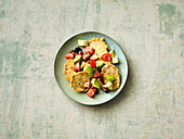 Vegetarian corn fritter with avocado and tomatoes