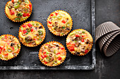 Omelette muffins with peppers, mushrooms and spring onions