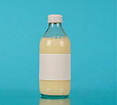 Small glass bottle with plant milk