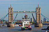 Ship approaching Tower Bridge, London, UK