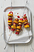 Colourful vegetable kebabs with corn-on-the-cob, mushrooms and peppers