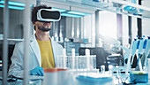 Laboratory scientist using virtual reality headset