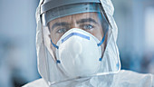 Tired medical worker wearing a face mask
