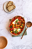 Oven baked beans with baked eggs and sourdough bread