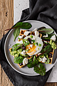 Savoury Waffles with Feta, Spinach, Avocado, Olives and Fried egg