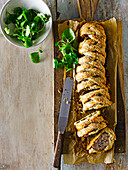 Fennel-spiced sausage plait