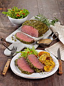 Roast beef with a herb mustard crust and rosemary potatoes