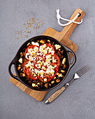 Aubergine bake with minced meat, feta cheese and tomatoes