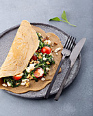 Buckwheat pancake with a feta and spinach filling