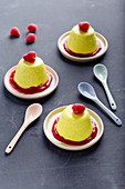 Turmeric panna cotta with raspberry coulis