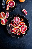 Blood oranges sliced in a bowl