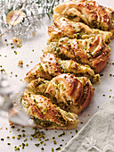 Yeast plait with marzipan and pistachio filling