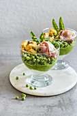 Green peas deep with croutons and prosciutto