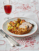 Roast pork with onions and rosemary potatoes