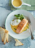Salmon steak with Holland sauce and poached egg