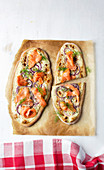 Smoked salmon tarte flambée with red onions, sour cream and dill