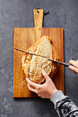 Preparing pull apart bread - cut the bread into a grid