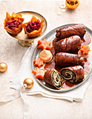 Veal rolls with red cabbage basket and burgundy sauce