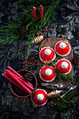 Santa hats with raspberry icing and coconut balls