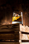 Whiskey on the rocks in glass tumbler