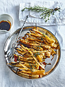 Sweet parsnips baked with wine and herbs