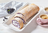 Meringue roll with blueberries