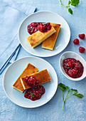 Custard cuts with lute and raspberry sauce