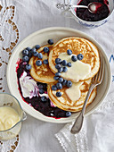 Pancakes with vanilla and blueberry sauce