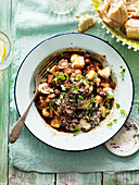 Gnocchi with herb and mushroom sauce
