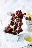Raspberry brownies with malted hot fudge sauce