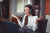 Young woman working in home office