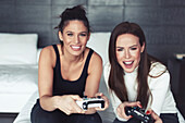 Women playing on games console