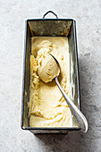 Honey lemon ice cream in metal tray