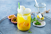 Mango and peach float with passion fruit