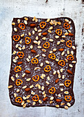 Dark chocolate with salted pretzels, peanuts and almonds