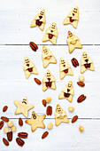 Butter biscuits with nuts, decorated with funny faces