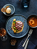 Christmas menu – duck breast with Brussels sprouts, pumpkin essence and ginger ice cream
