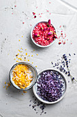 Colourful bath salts with dried flower petals