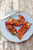 Roasted peppers with bread, olives and anchovies in oil