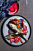 Fried sardines with beetroot and apricot salad