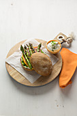 Asparagus burger with ham, cheddar and sour cream
