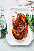 A beef chop with herbs and garlic