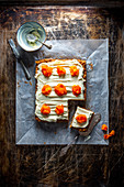 Pineapple and carrot cake with cream cheese frosting and candied carrots