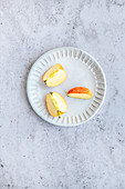 Slices of envy apples on a decorative ceramic plate