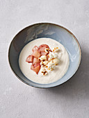 Marinated Peaches with popcorn on yogurt cream (vegan)