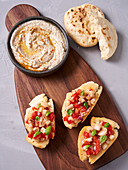 Tomato and eggplant bruschetta and baba ganoush with bread