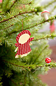 Christmas tree with DIY paper Mrs Christmas decoration and small toadstools