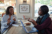 Businesswomen having a meeting in a cafe